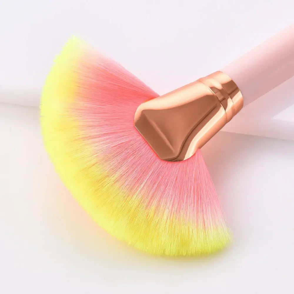 Set of 12pcs beauty makeup brushes with pink and gold handles and gradient yellow to pink bristles for versatile use