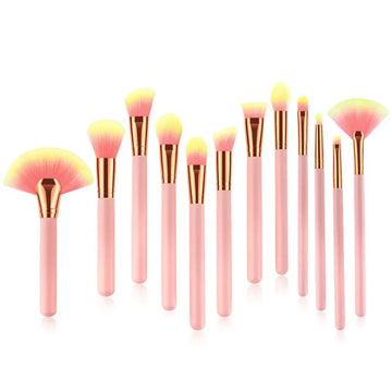 Set of 12pcs beauty makeup brushes with pink and gold handles and gradient yellow to pink bristles for versatile use