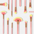 Set of 12pcs beauty makeup brushes with pink and gold handles and gradient yellow-tipped bristles