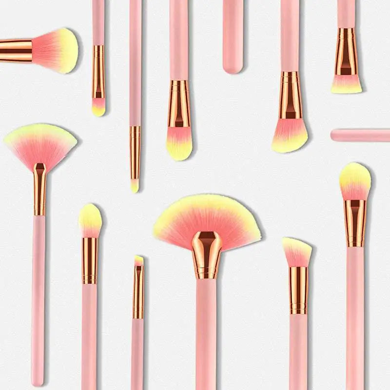 Set of 12pcs beauty makeup brushes with pink and gold handles and gradient yellow-tipped bristles