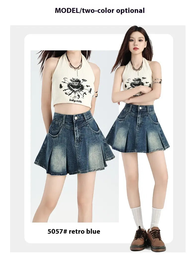 a cream-colored halter top with a black graphic print and baby sota branding paired with retro blue pleated shorts styled as a vintage denim skirt high waist cream halter set