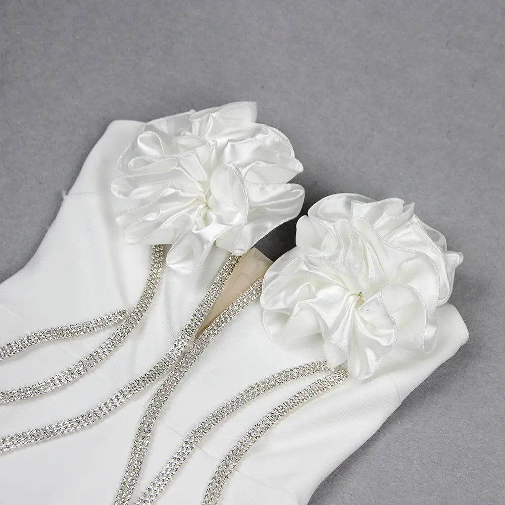 white satin gloves with large ruffled floral embellishments and sparkling rhinestone straps for style temperament socialite evening wear.