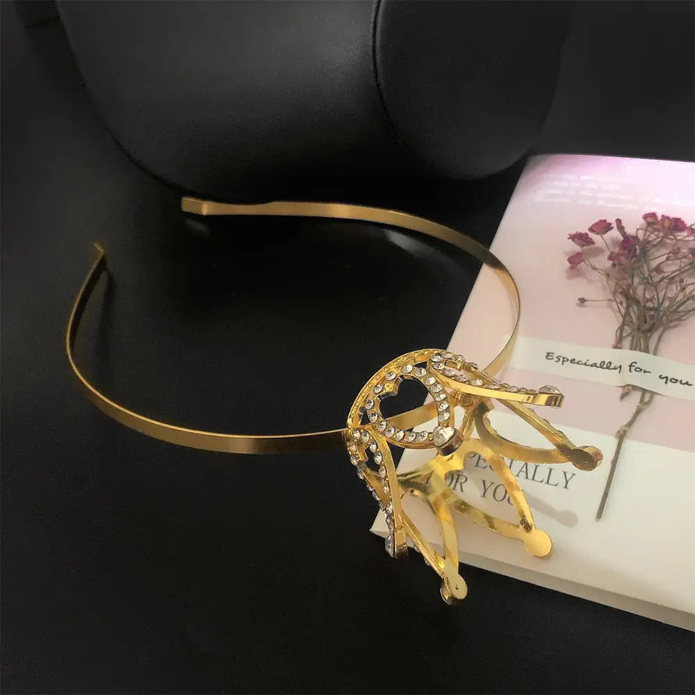 gold-toned hair comb crown adorned with sparkling rhinestones and intricate metalwork as a crown rhinestone accessory for children