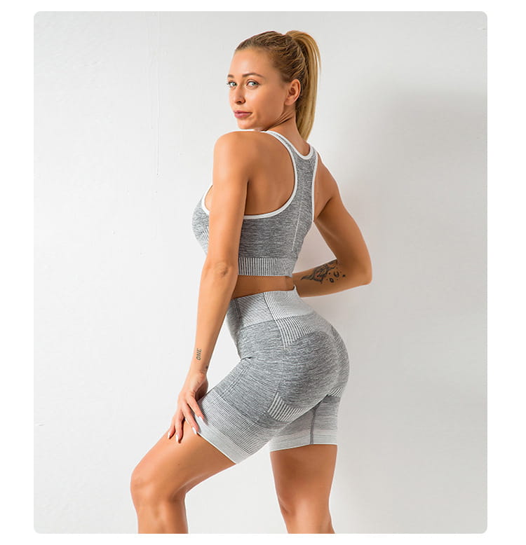 Gray and white heathered seamless yoga hip lifting workout set for women with ribbed detailing designed for comfortable exercise.