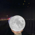 White textured moon night table lamp with realistic moon surface and 16-colour remote control feature