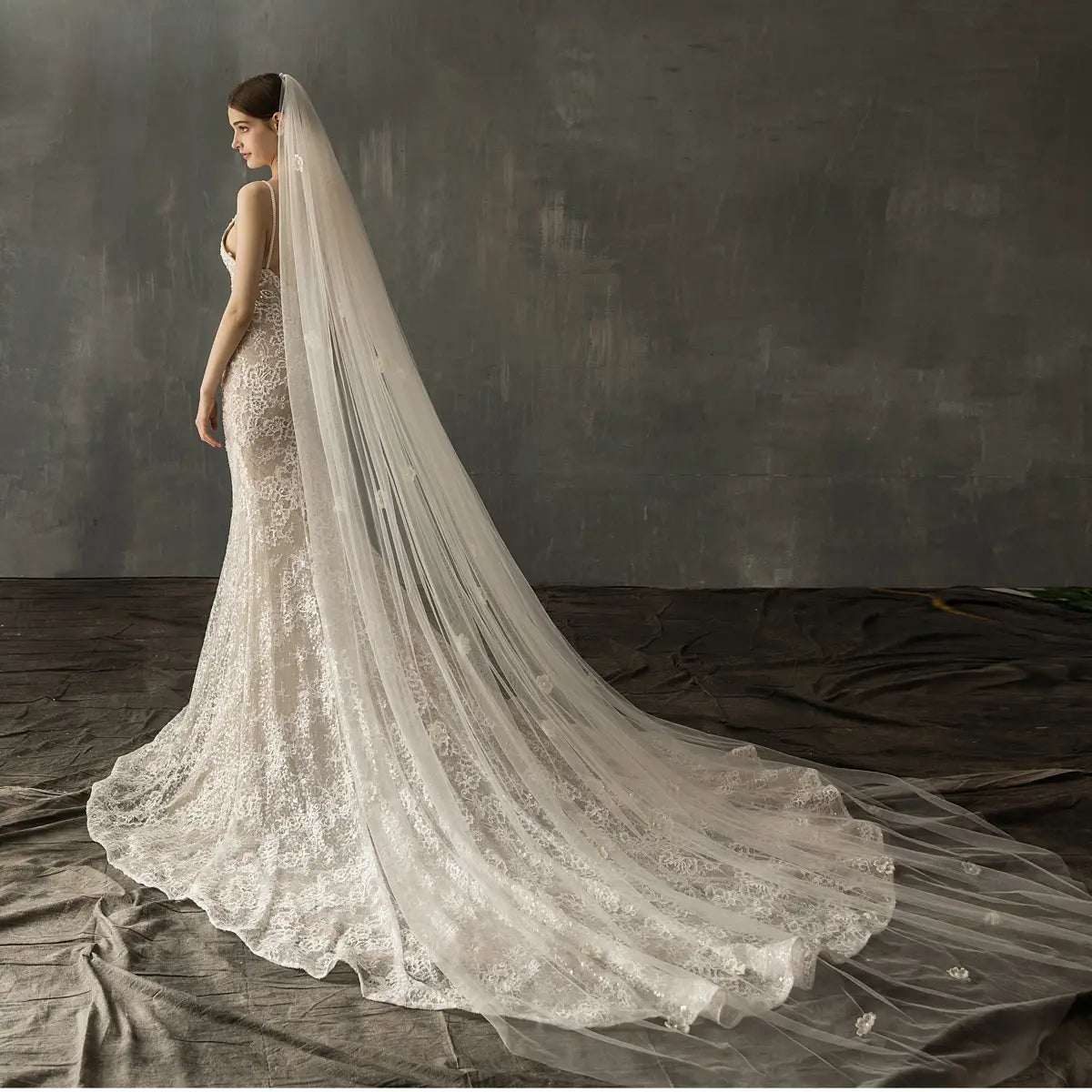 Ivory lace bridal church wedding veil with delicate floral embroidery and sheer trailing design for wedding pearl long gowns.