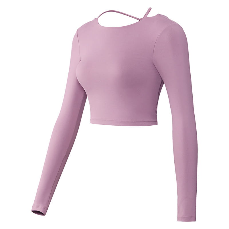 A soft lavender mauve crisscross strap long sleeve yoga crop top with a sleek, form-fitting design and delicate shoulder straps.