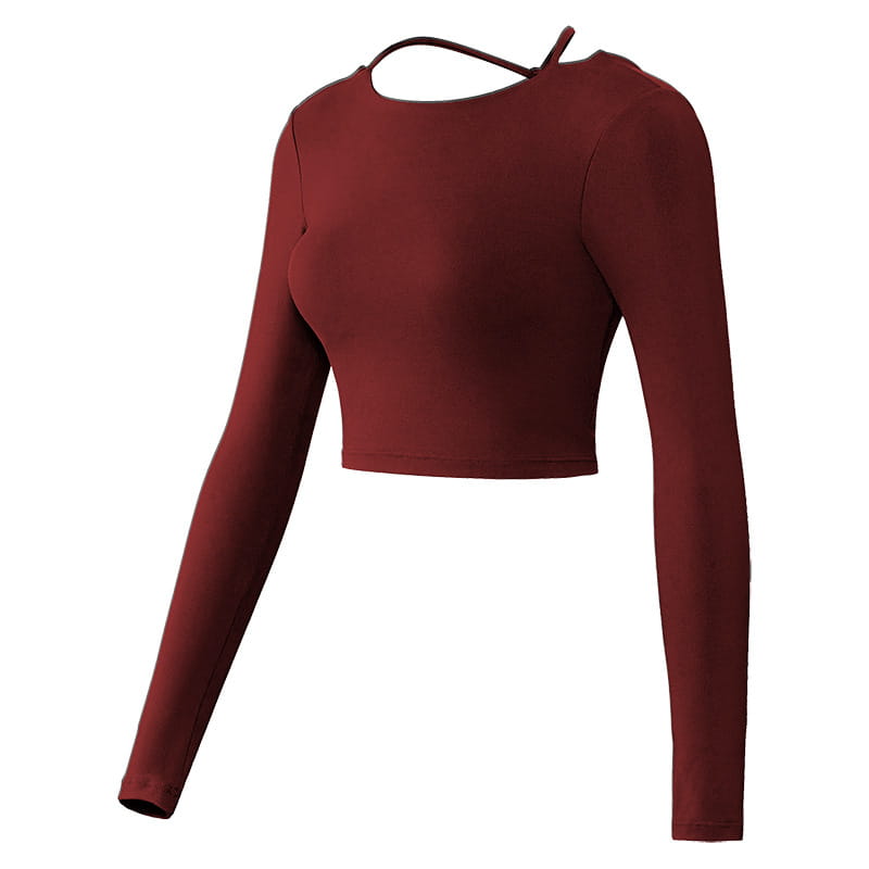 A maroon long sleeve yoga crop top with crisscross straps and a back tie detail.