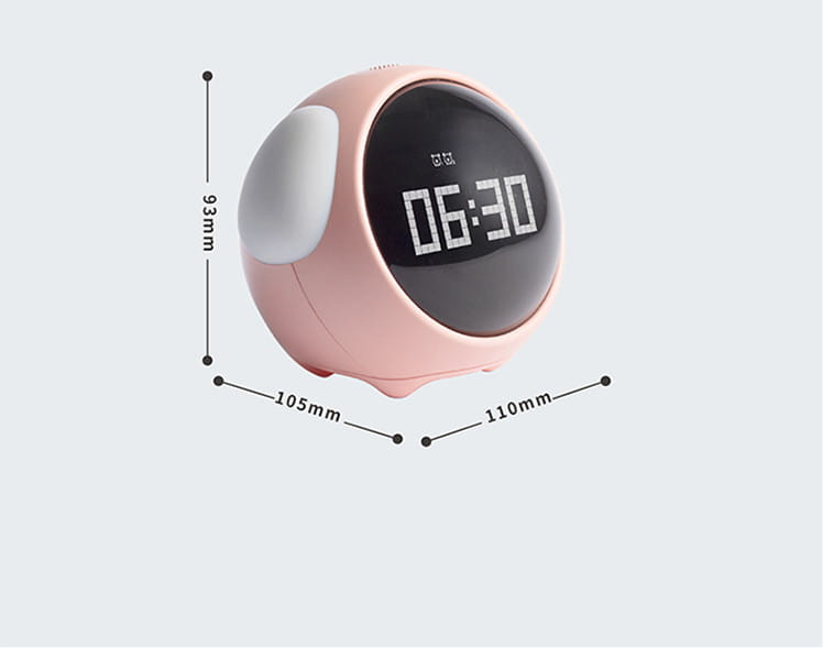 pink rounded digital electronic cute alarm clock with pixel expression black display showing 0630 and white ear-like side accents