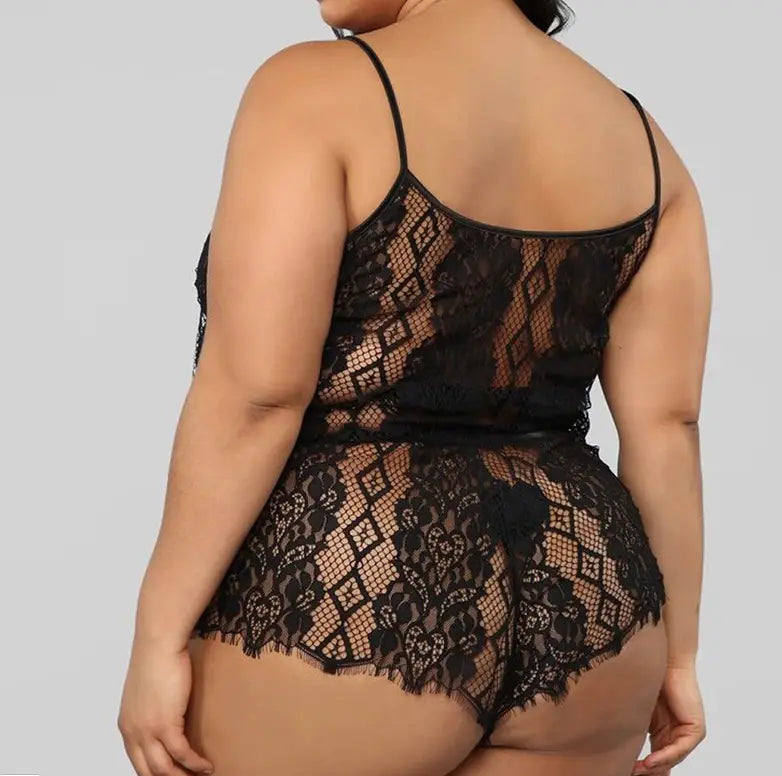 plus size black two piece underwear lace set featuring a black lace bodysuit with intricate floral and geometric patterns, thin spaghetti straps, and a fringed hemline.