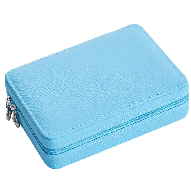 light blue faux leather multifunctional jewelry storage box with double zipper closure and silver-toned metal hardware for enhanced jewelry storage and organization