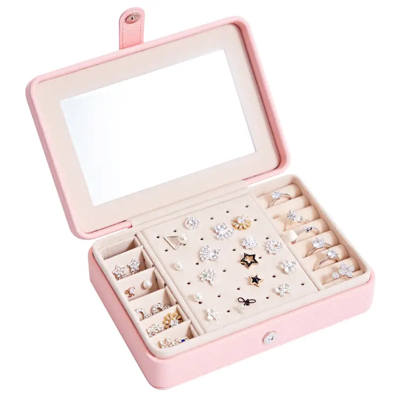 pink faux leather multifunctional jewelry storage box with mirrored lid and organized compartments for earrings studs and rings