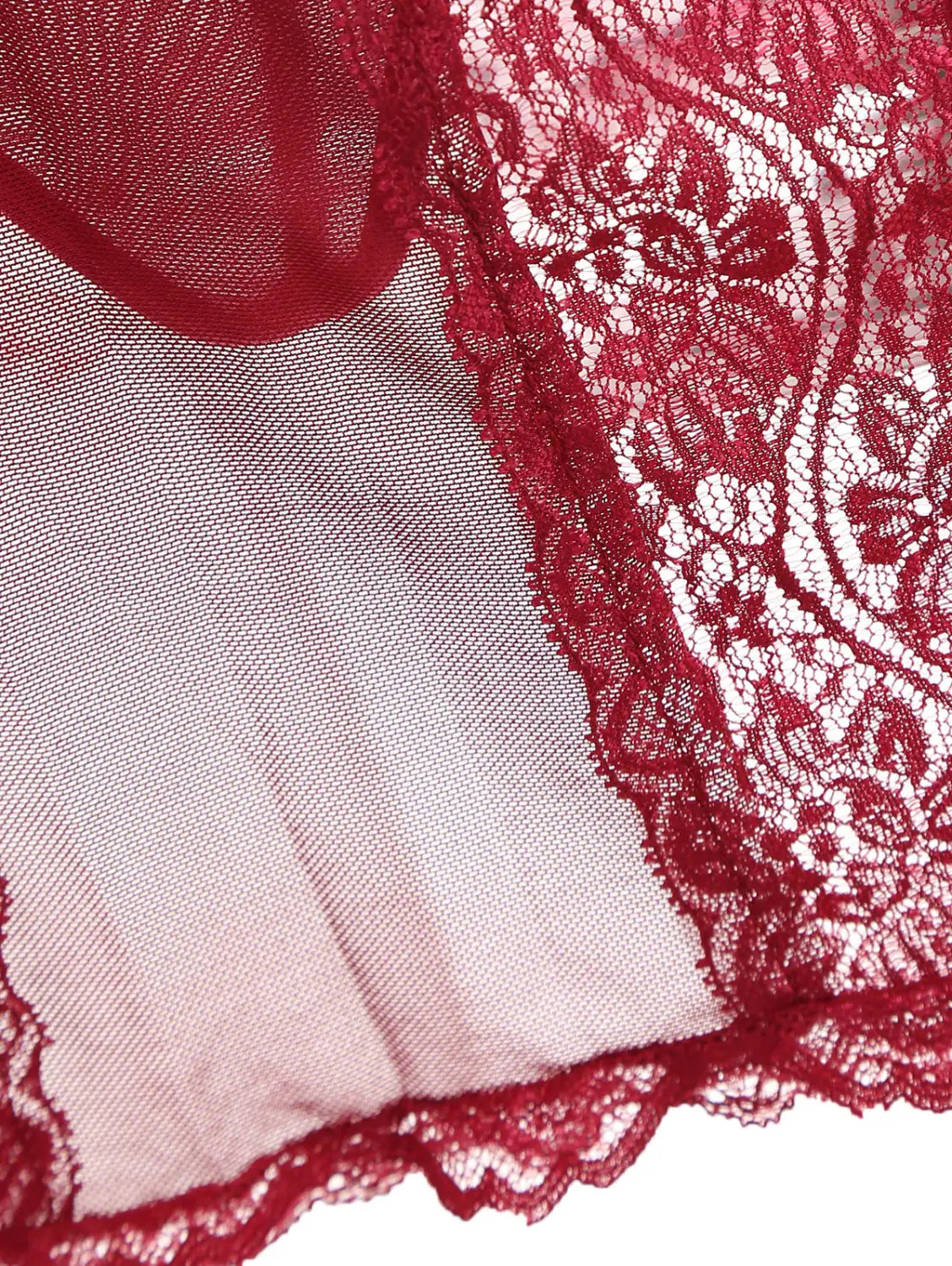 a delicate red lace sling long skirt with intricate floral patterns overlays sheer light pink fabric in a plus size nightdress