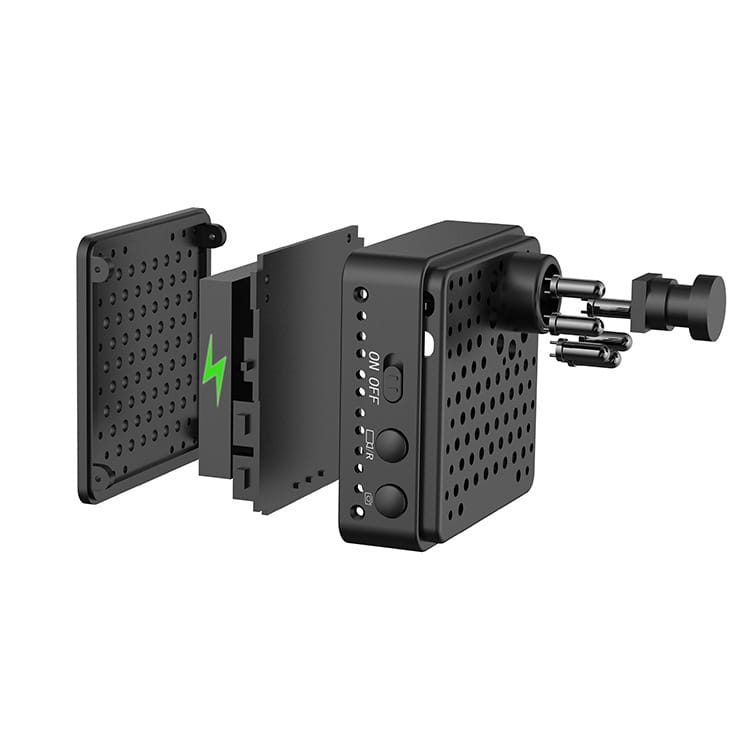 Black perforated travel charger with integrated power adapter and multiple output ports for outdoor aerial photography hd night device use.