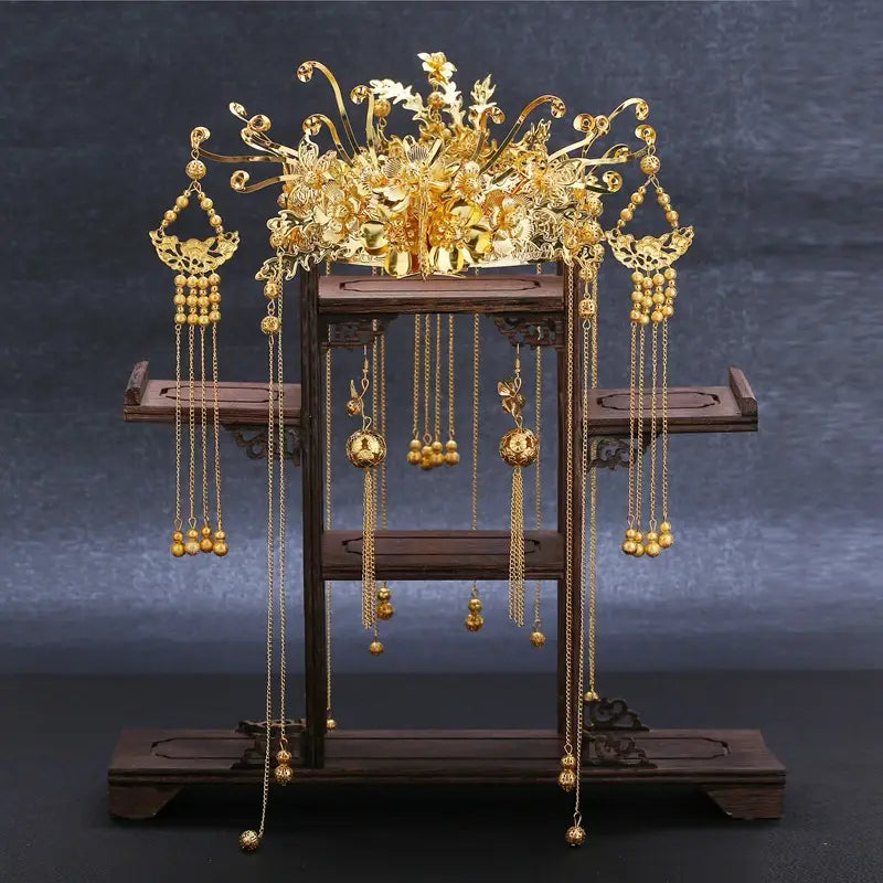golden ornate tassel suit wedding cheongsam hair accessory featuring intricate floral and dragon motifs with dangling chains of beads and spherical ornaments