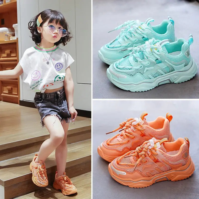 Mint green and orange chunky mesh sports shoes with thick soles designed as older children’s casual shoes.