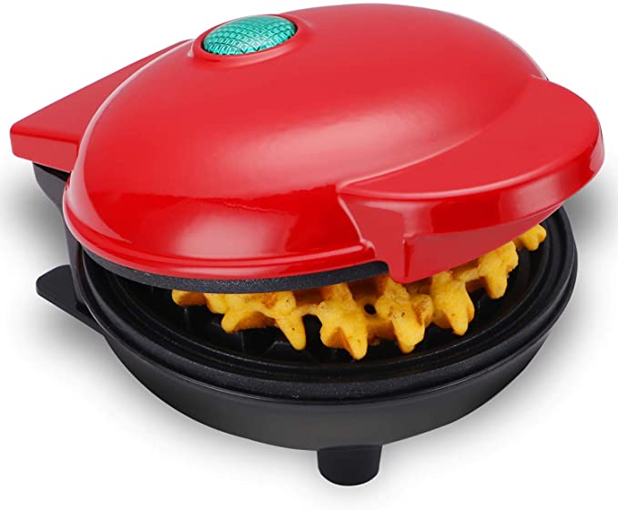 Mini electric waffle maker in red and black with a teal button on the lid and a non-stick cooking surface for easy waffle preparation.