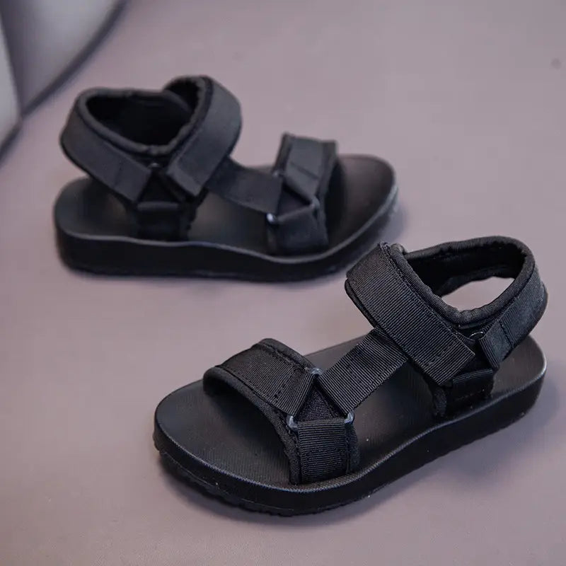 black childrens peach breathable casual shoes with adjustable velcro straps and a padded footbed designed as school breathable casual footwear