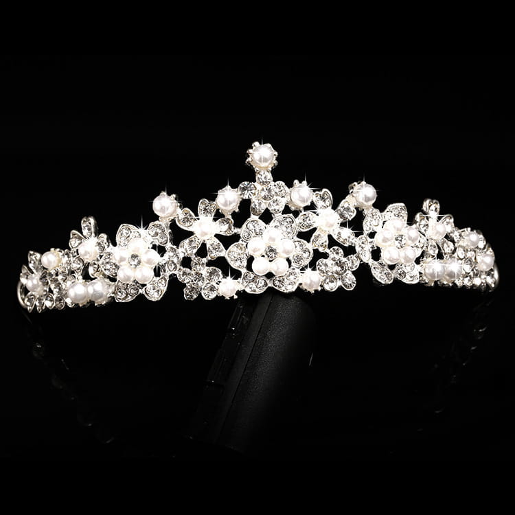 A sparkling silver alloy headdress bridal crown adorned with intricate floral designs featuring clear crystals and delicate white pearls.