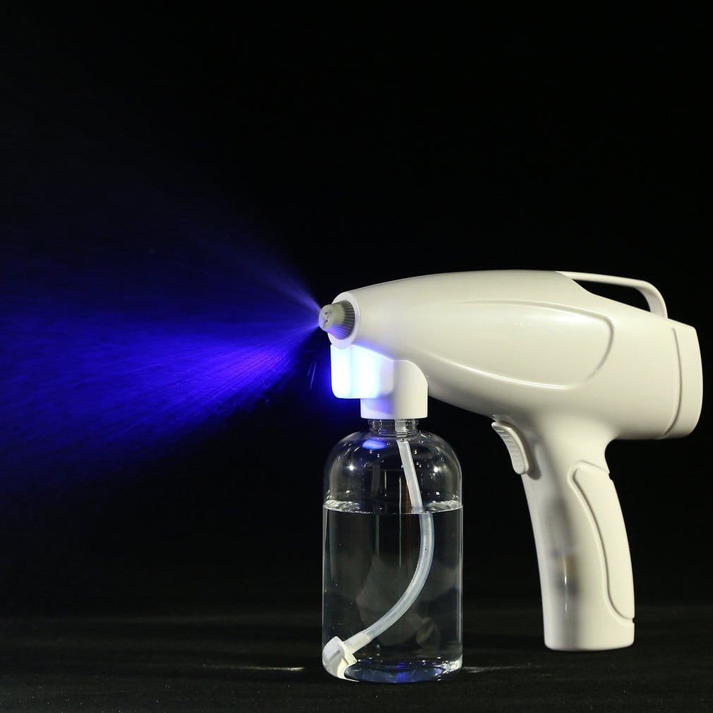 White wireless electric sprayer disinfection gun with a clear liquid reservoir and blue LED light emitting mist for efficient sanitization.
