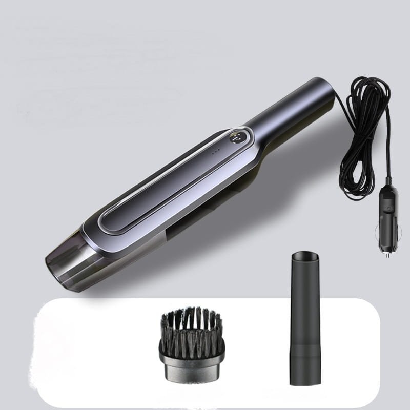 Sleek gray and black cordless handheld vacuum cleaner with black and silver body, detachable brush attachment, and crevice tool featuring a powerful suction head.