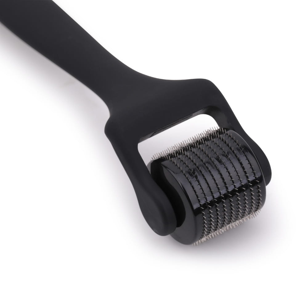 Matte black microneedle roller feel with a sleek ergonomic feel oil rubber handle and a dense array of fine metallic needles embedded in its cylindrical head.