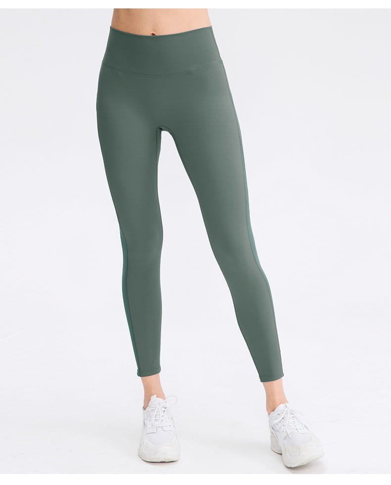 olive green women seamless high waisted yoga pants shown from the back featuring butt lifting workout design and lifting workout leggings material