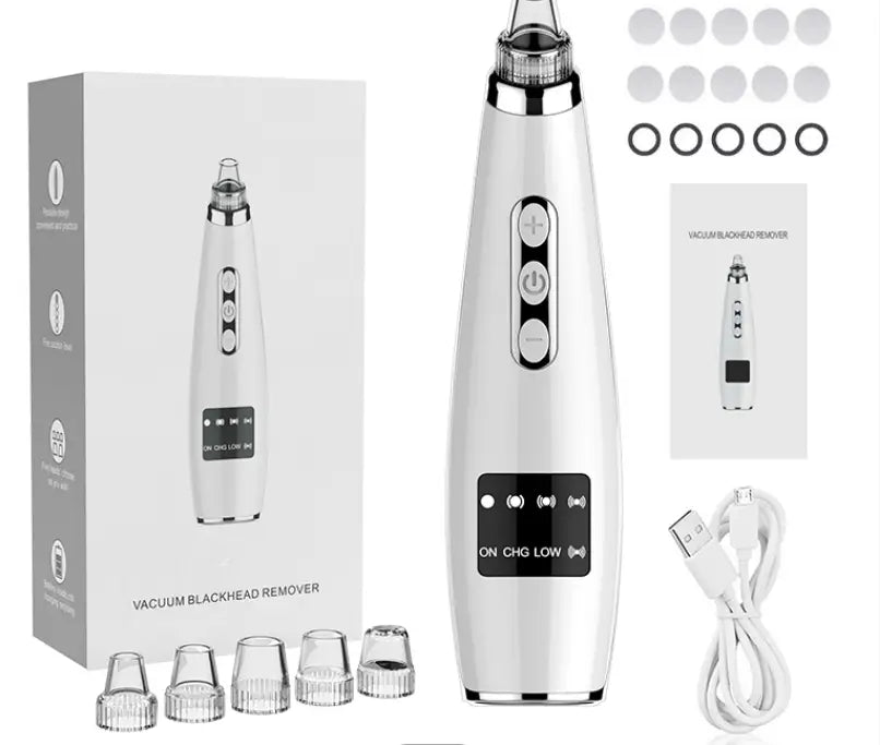 Silver and white handheld electric black head suction instrument with a sleek ergonomic design for effective black head removal.
