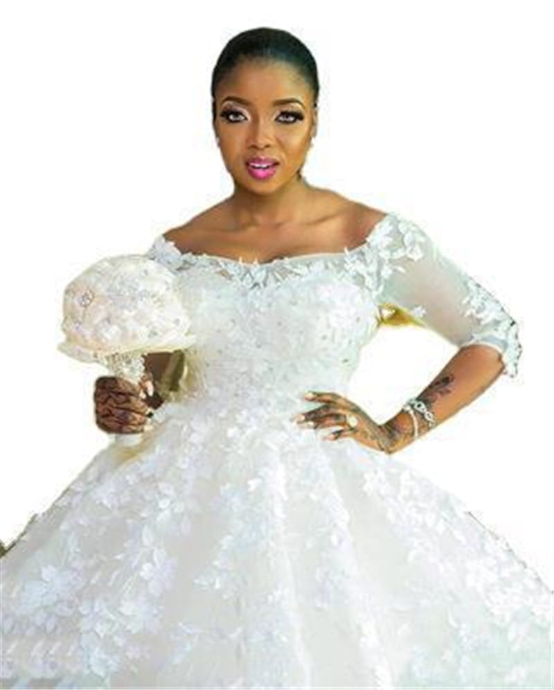 White lace wedding dress for pregnant women princess with off-the-shoulder lace sleeves and a voluminous skirt.