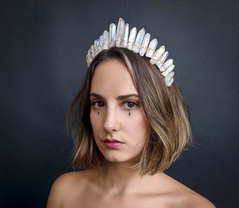 A delicate translucent white quartz crystal crown headband hair accessory with a natural faceted design suitable for bridal hair accessories.