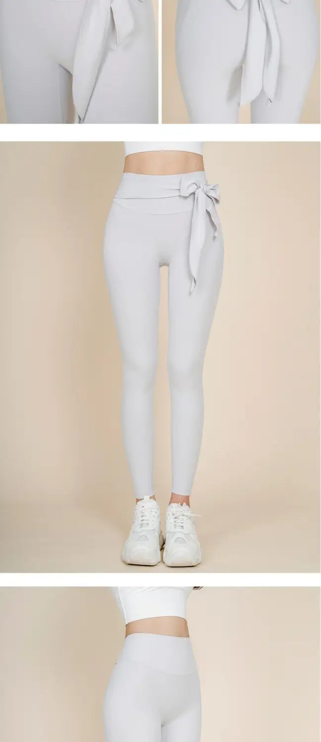 Light gray high-waisted korean fashion yoga pants with a tied bow at the waist suitable for nude sports yoga and casual wear.
