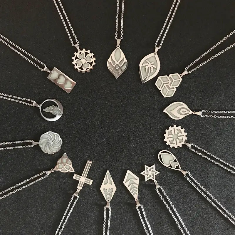 Silver pendants with intricate gear leaf and symbol designs featured in a titanium steel luminous necklace couple jewelry set.