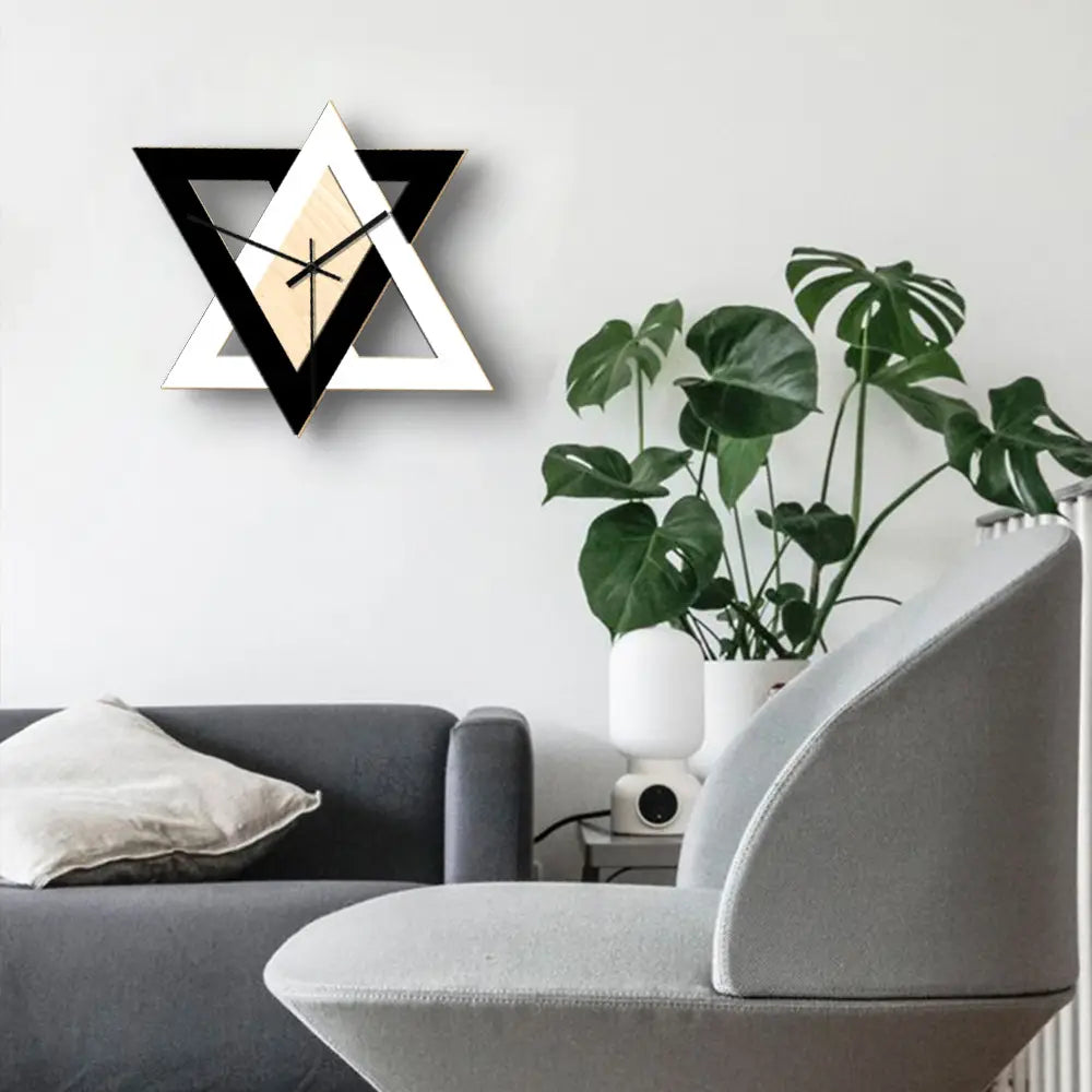 Nordic personality black and white creative wall clock featuring a geometric design with a beige center.