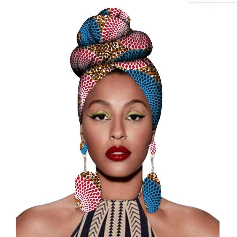a vibrant patterned fashion african headscarves featuring bold pink and blue colors with gold accents in a floral fashion african headscarves and earrings set