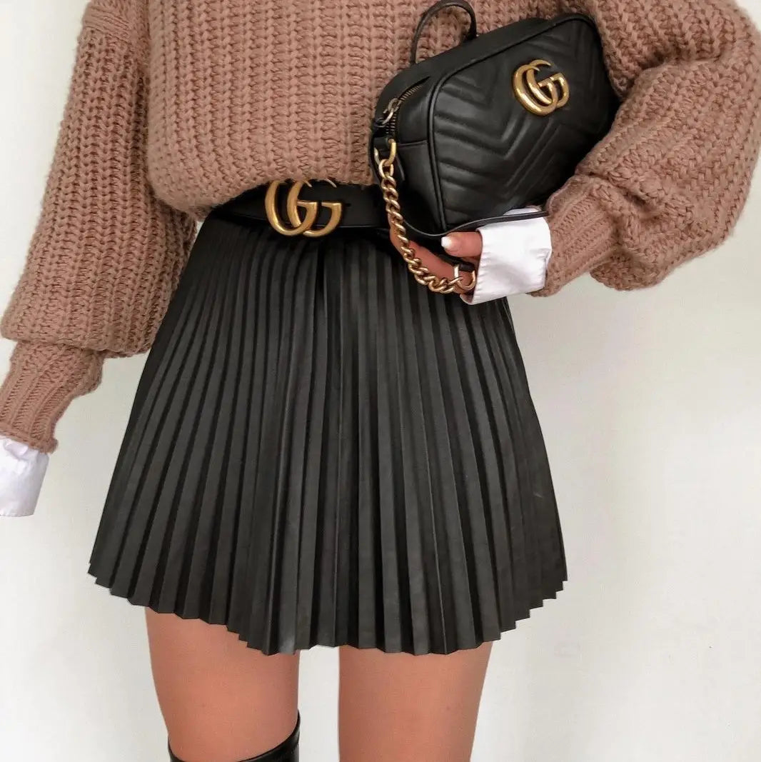 black draped pleated knitted mini skirt with gold-tone gg buckle belt featuring fine pleated knitted texture and elegant design