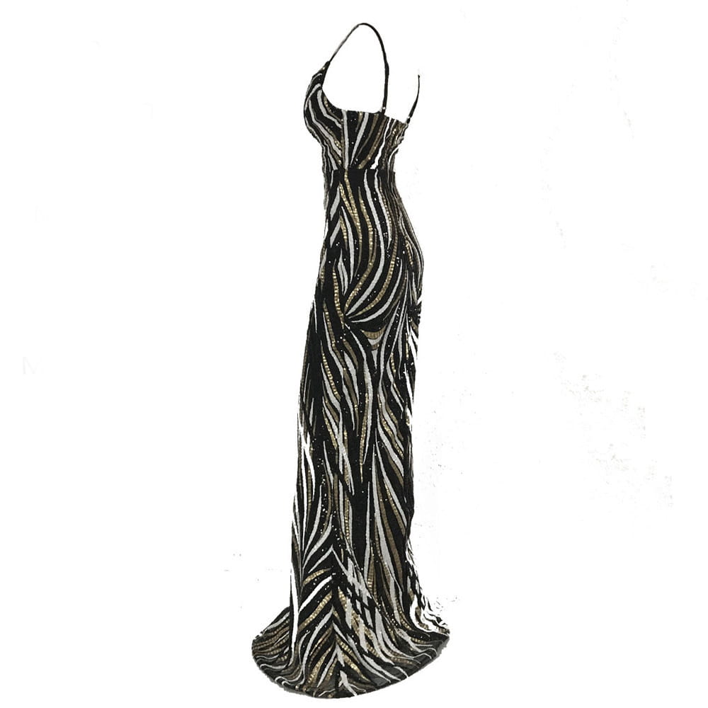 black and silver sequined mermaid evening dress featuring a fitted bodice, thin spaghetti straps, and flowing zebra-striped patterns for an elegant evening dress look