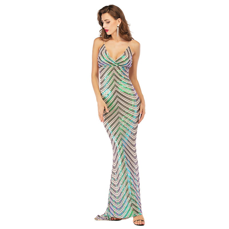 A shimmering green and silver stretch sequined mopping dress in a mermaid style with a plunging neckline.