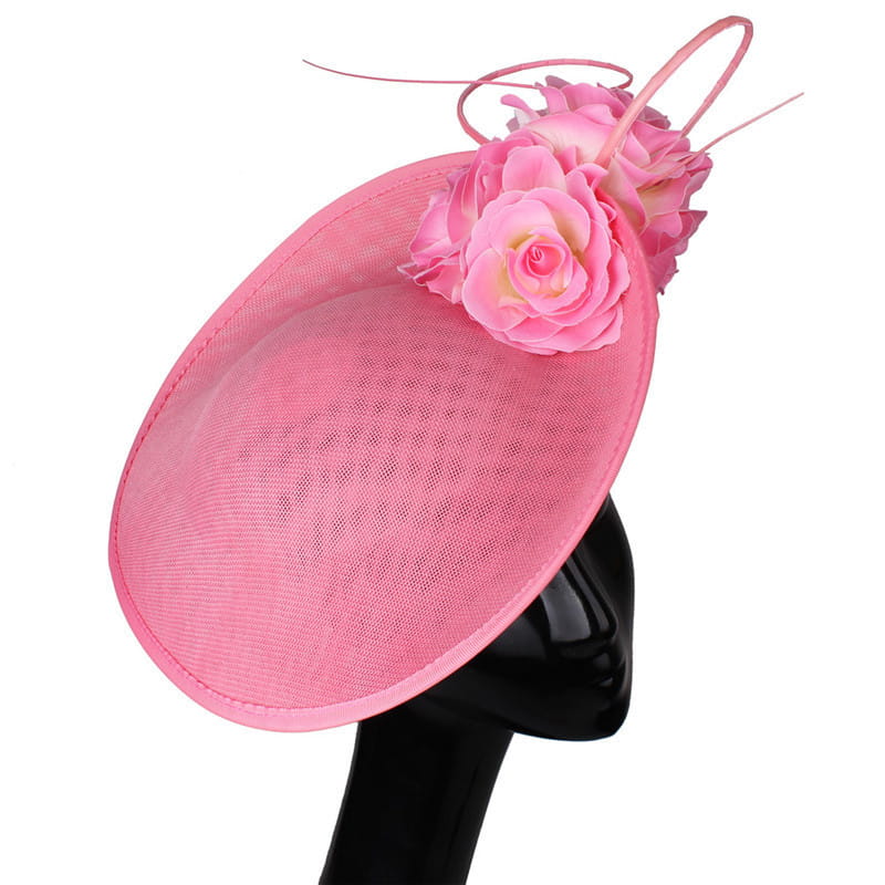a pink fascinator hat with delicate mesh texture adorned with artificial roses and wire accents designed as a headdress bride beige imitation linen headband