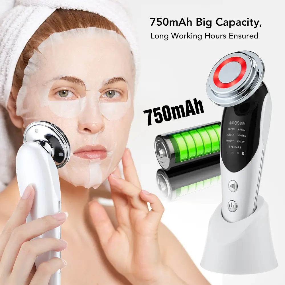 White and silver 7-in-1 facial massager ems with a circular red-accented color light vibration treatment head and light vibration led features for skincare.