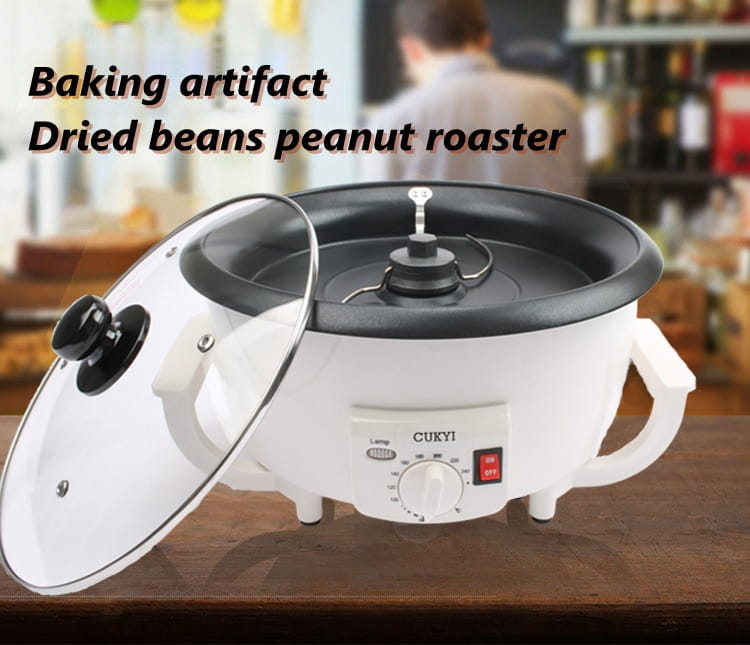 White cukyi brand electric coffee roasting machine with a white exterior, black interior, glass lid, and control panel featuring temperature settings for coffee roasting.