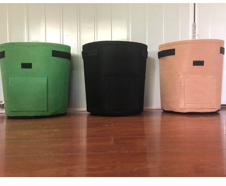 Set of three fabric planting bag potato in green black and beige with reinforced handles front pocket and windows for growing potatoes.