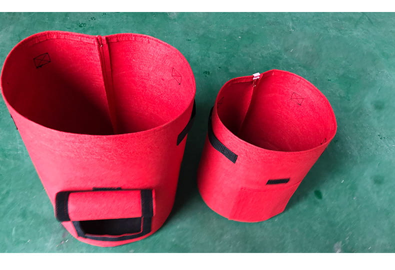 set of 3 red fabric planting bags for potato with windows and black straps and handles for easy transport