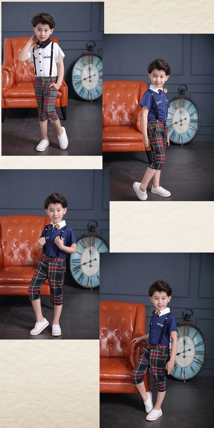 The boy is wearing a men’s plaid suspenders treasure suit tide suit featuring a navy blue short-sleeved polo shirt with white collar and placket paired with black and red tartan capri pants.