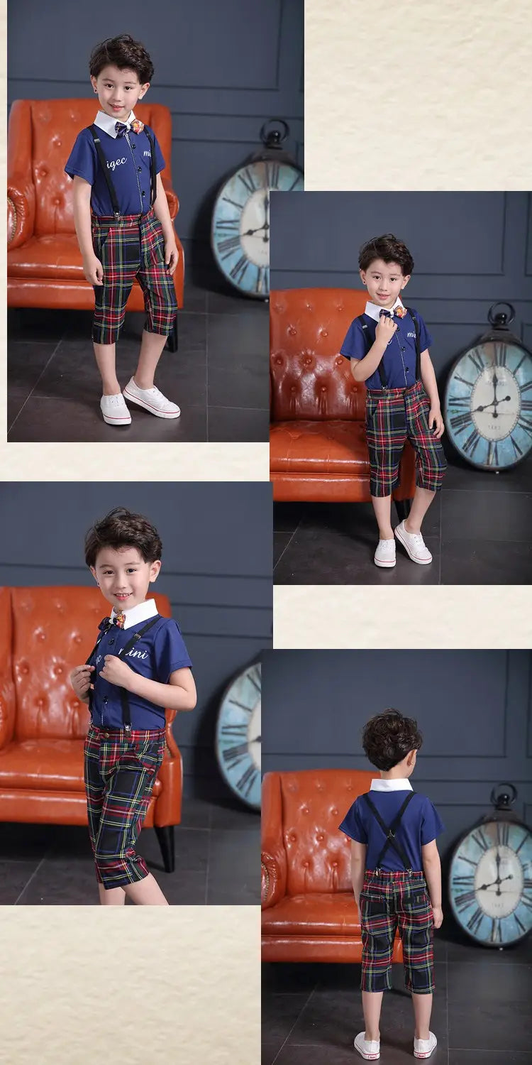 men’s treasure suit tide features a navy blue short-sleeved shirt with a white collar and embroidered logo, paired with red green and black plaid capri pants with suspenders.