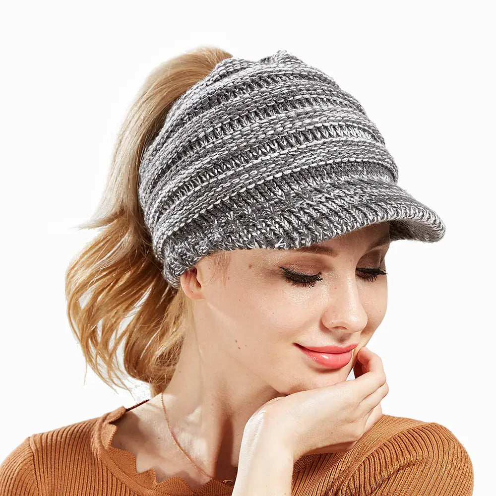 gray and white striped knitted women ponytail beanie with a small brim suitable for autumn winter beanies.