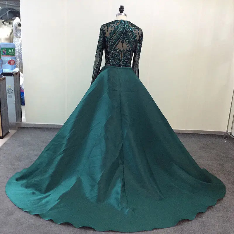 emerald green satin lace evening dress featuring a main fabric composition of satin with long sleeves and a beaded bodice designed for formal occasions