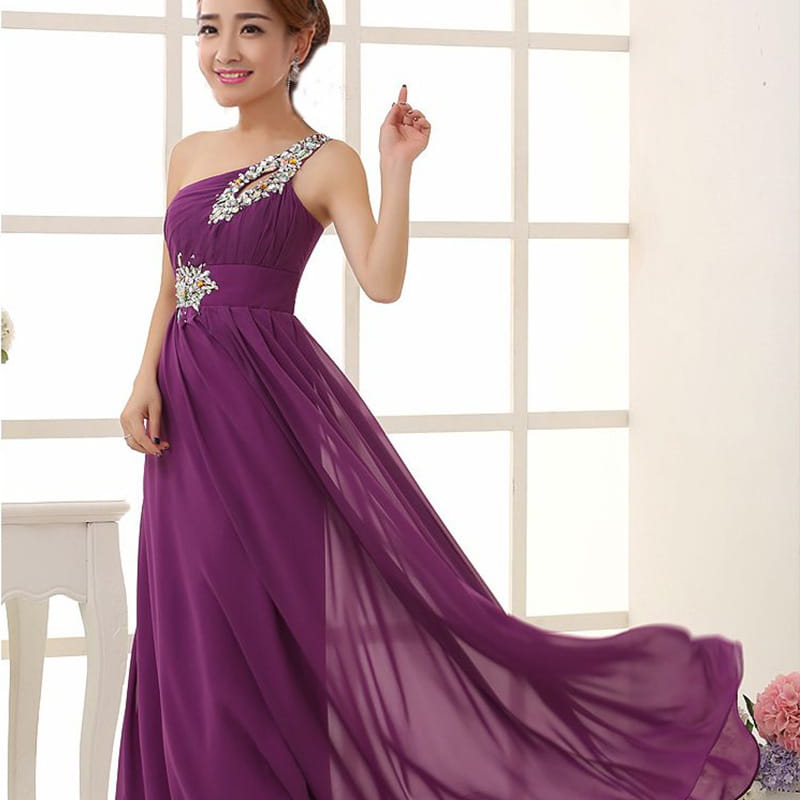 coral pink embellished chiffon evening dress featuring a flowing lavender chiffon fabric with one-shoulder design and sparkling beaded embellishments along the neckline and waistband, ideal for dinner banquet long events.