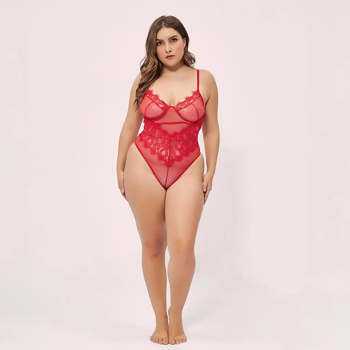 Red lace mesh bodysuit with sheer panels and delicate floral embroidery featuring a deep v lace design.