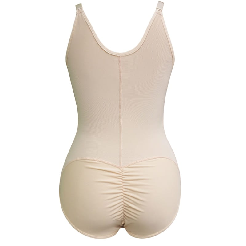 beige form-fitting plus size shaping one-piece bodysuit with ruched back and thin straps designed as size shaping underwear with front zipper closure.