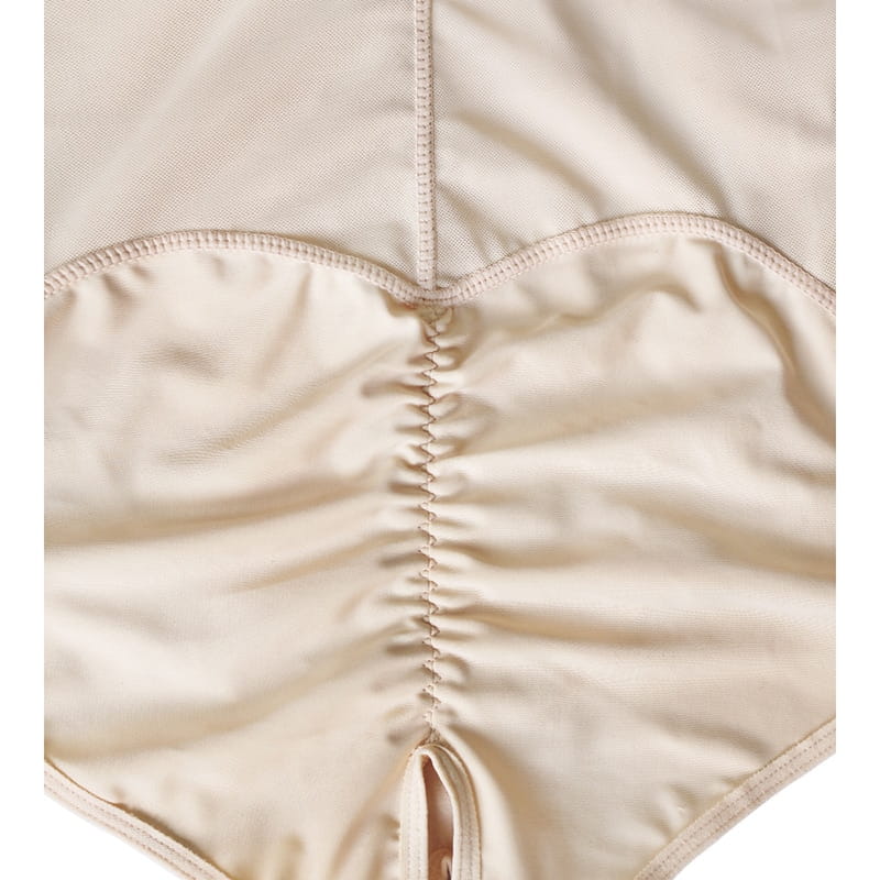 plus size shaping underwear beige stretchy bodysuit with central ruched seam and matching stitching featuring a front zipper for enhanced fit and comfort